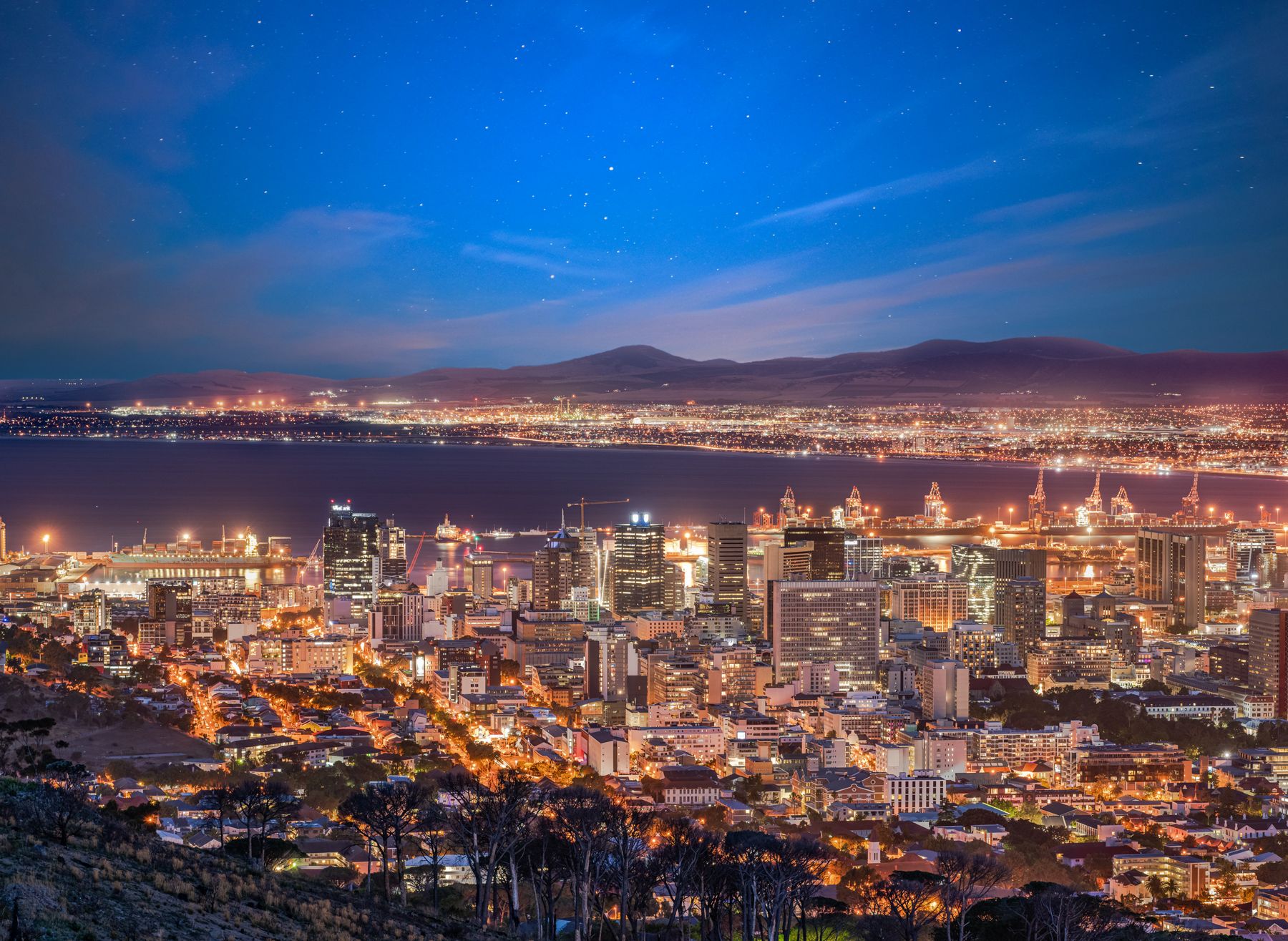 Cape Town city bowl and harbour lit up at night